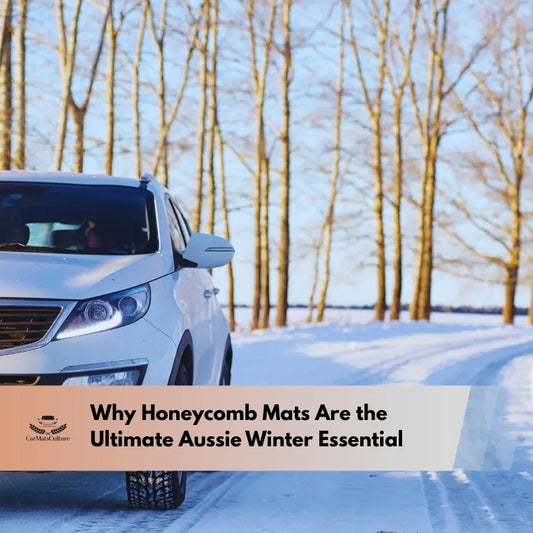 White SUV driving on a snowy winter road lined with trees
