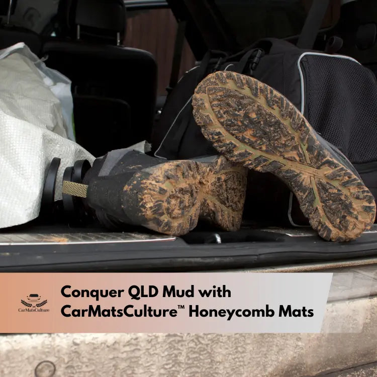 Muddy boots and gear in the back of a car after driving through Queensland mud