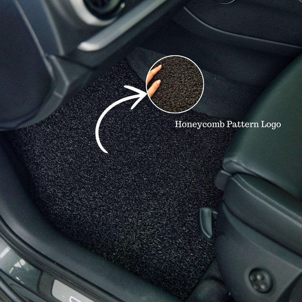 Honeycomb detail on a CarMatsCulture mat fitted inside a real car