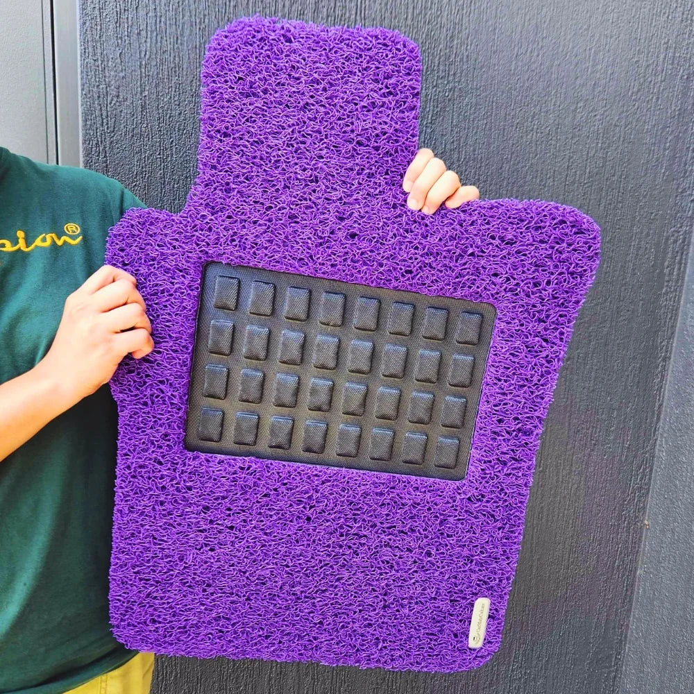 A clean Sangria Purple CarMatsCulture mat held upright to dry