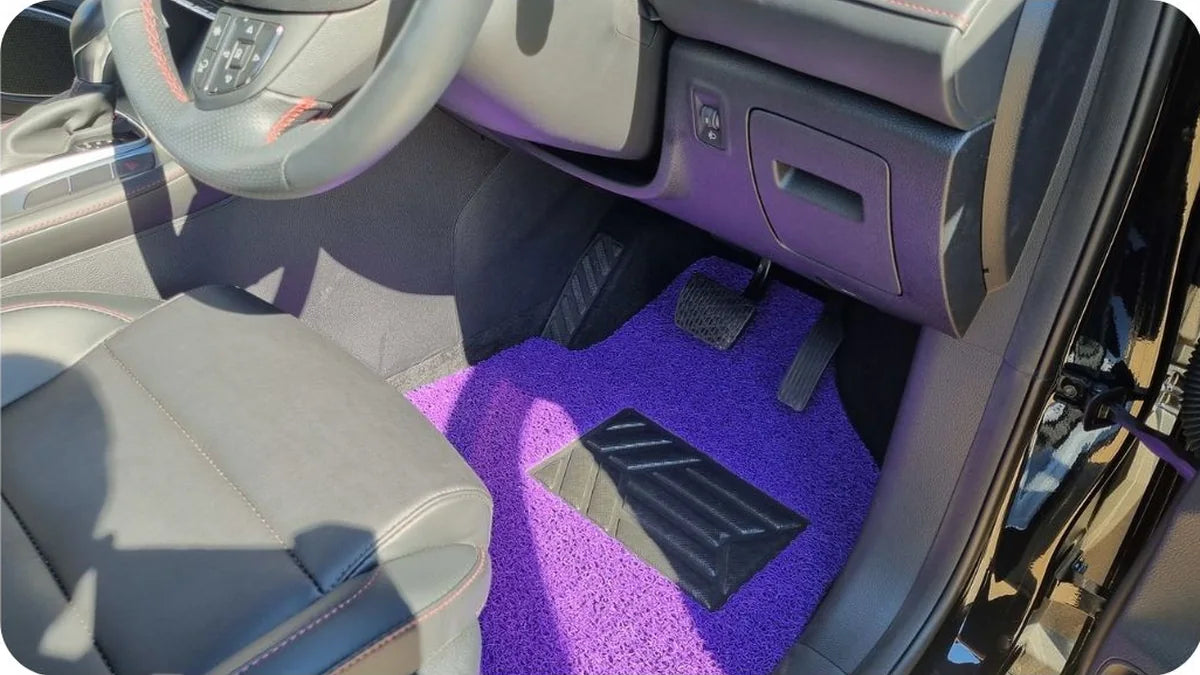 Purple CarMatsCulture mats installed in Rhiannan O.'s MG HS