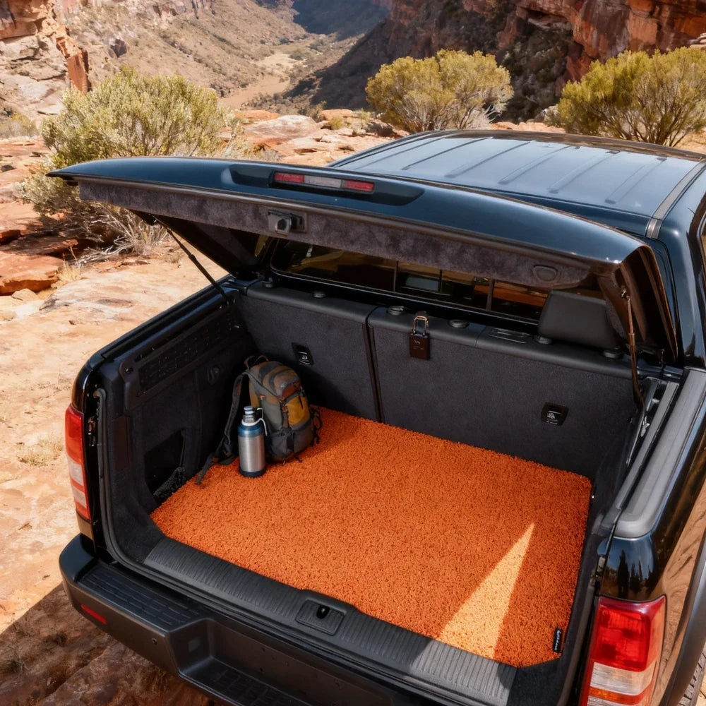 Tangerine Amber mat precisely fitted inside an Australian ute tub