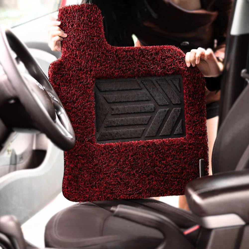 Vivid Burgundy honeycomb car mat being cleaned