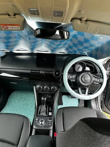 Kimberley W.’s Bondi Blue car mats installed in a Mazda CX-3